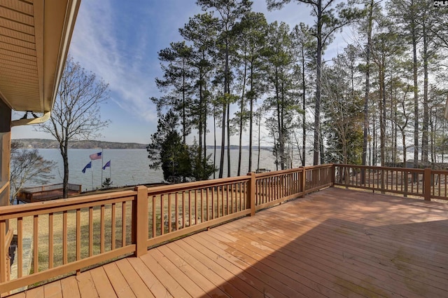 wooden terrace with a water view