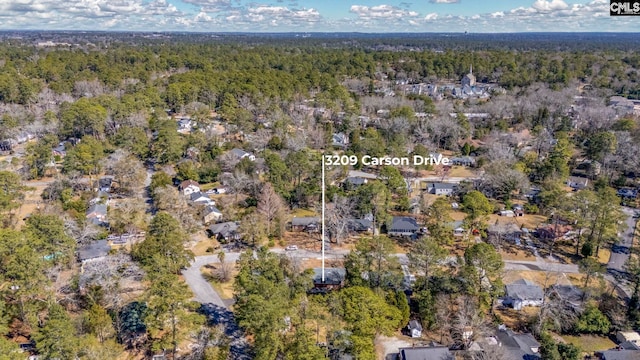 aerial view featuring a forest view