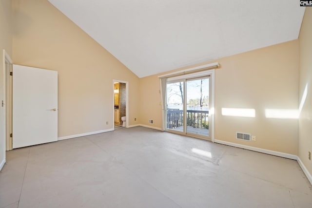 spare room featuring high vaulted ceiling, baseboards, visible vents, and concrete flooring