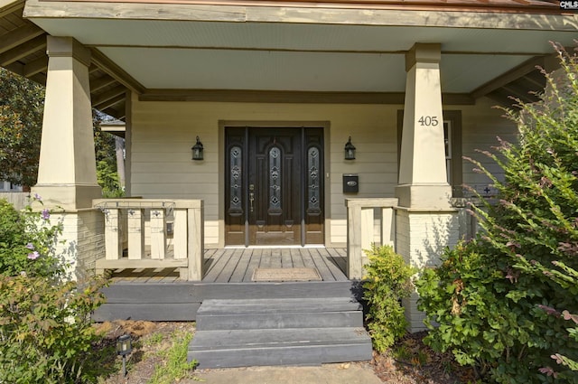 entrance to property with a porch