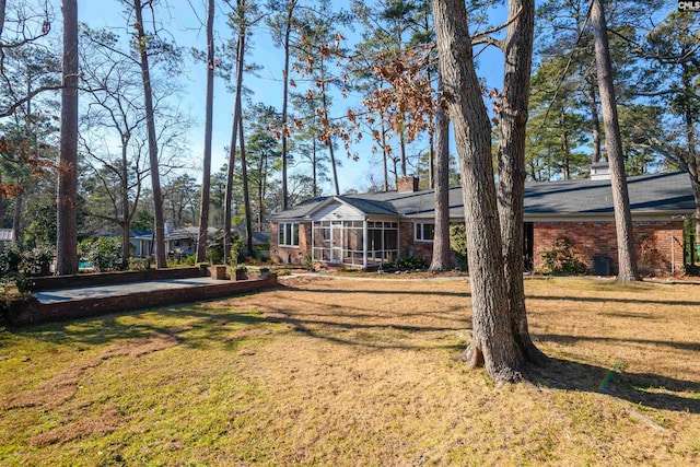 exterior space with a sunroom