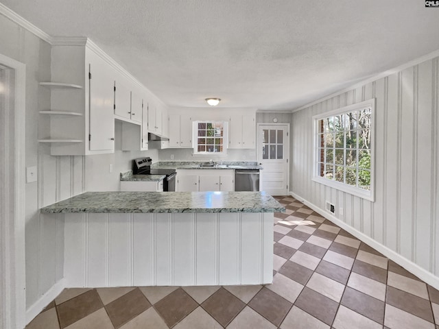 kitchen with appliances with stainless steel finishes, a peninsula, under cabinet range hood, white cabinetry, and open shelves