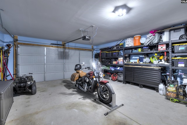 garage featuring a garage door opener