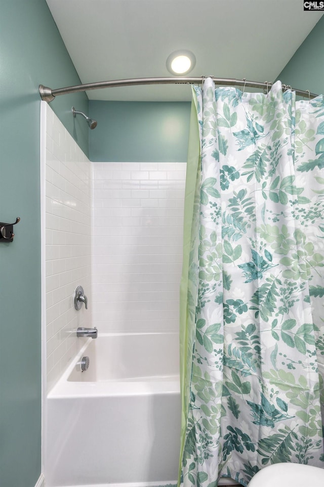 full bath featuring shower / tub combo