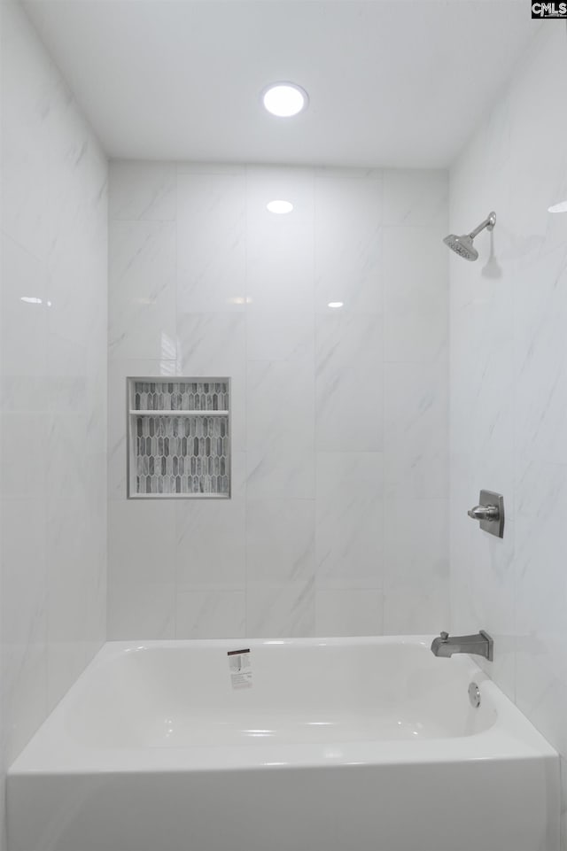 bathroom featuring bathing tub / shower combination