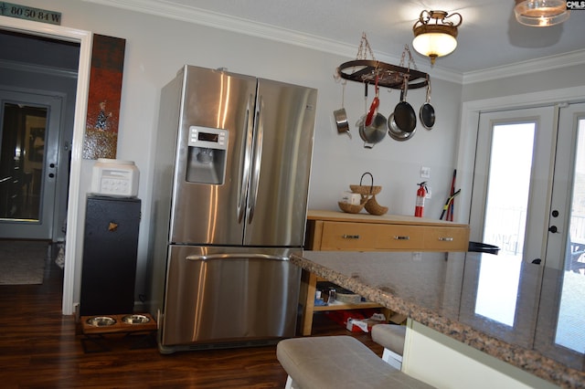 kitchen with dark wood-style floors, stainless steel fridge, ornamental molding, and french doors