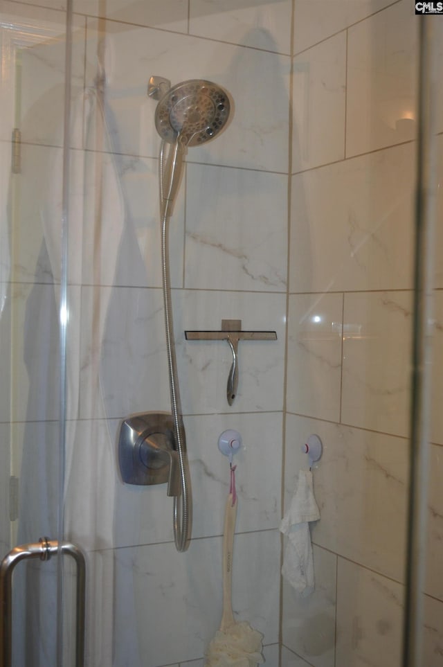 bathroom featuring a stall shower