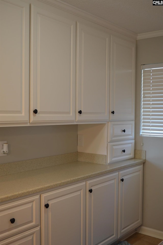 interior space featuring crown molding