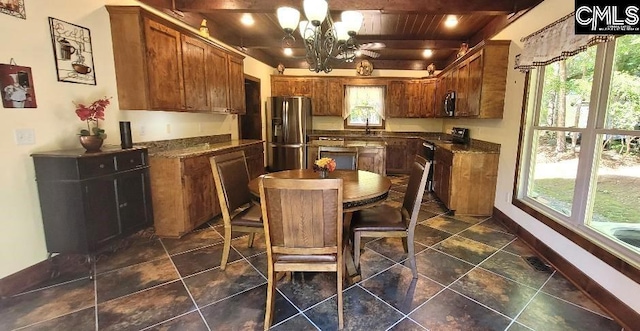 dining room with baseboards, wooden ceiling, beam ceiling, and a notable chandelier