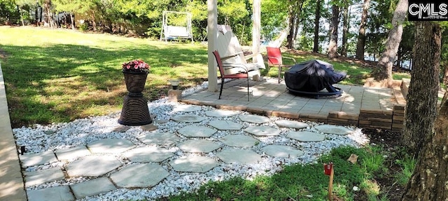 view of patio with a grill