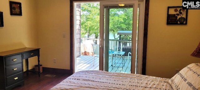 bedroom featuring dark wood-type flooring