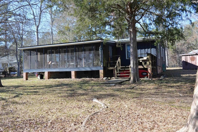 exterior space with a sunroom