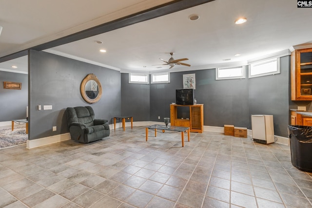 living area featuring recessed lighting, crown molding, baseboards, and light tile patterned floors