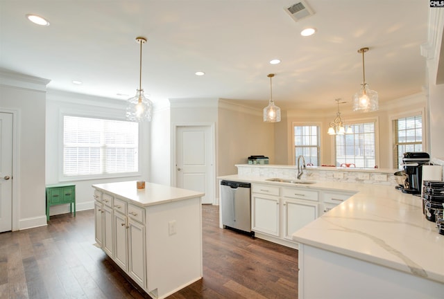 kitchen with dark wood-style floors, visible vents, ornamental molding, a sink, and dishwasher