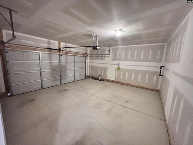 garage featuring a garage door opener