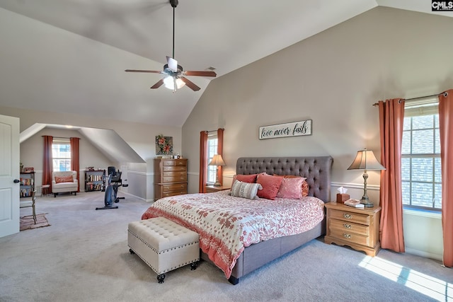 bedroom featuring high vaulted ceiling, carpet flooring, and a ceiling fan