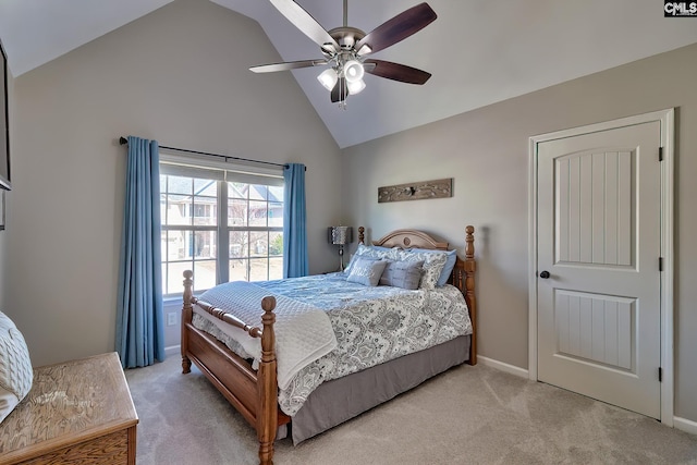 bedroom with light carpet, high vaulted ceiling, ceiling fan, and baseboards