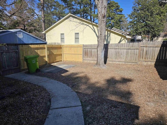 view of yard featuring a fenced backyard