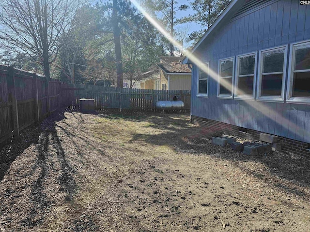 view of yard featuring a fenced backyard