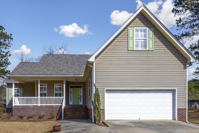 view of front facade with brick siding, a shingled roof, covered porch, a garage, and driveway