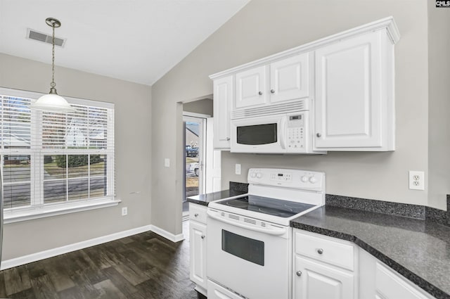 kitchen with lofted ceiling, white appliances, white cabinetry, and visible vents