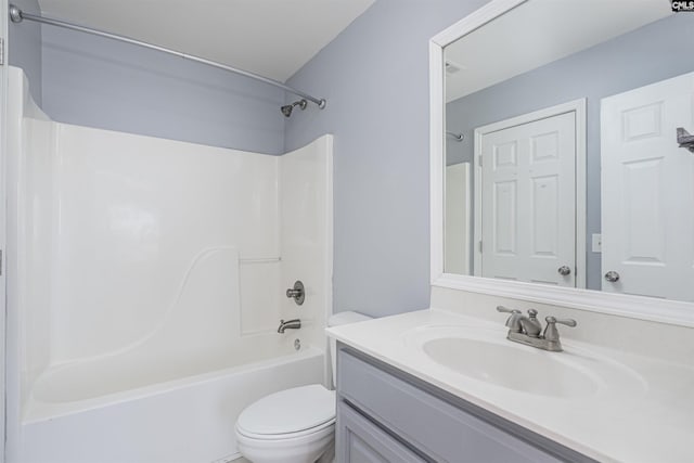 full bath featuring shower / washtub combination, vanity, and toilet