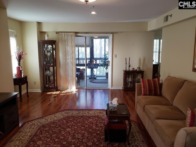 910 Poinsett Pl Unit 5, West Columbia, SC 29169 - living area featuring baseboards and wood finished floors