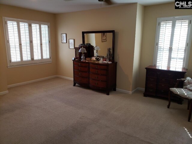 910 Poinsett Pl Unit 5, West Columbia, SC 29169 - carpeted bedroom with baseboards