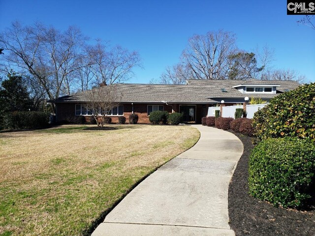 910 Poinsett Pl Unit 5, West Columbia, SC 29169 - view of front facade featuring brick siding and a front yard