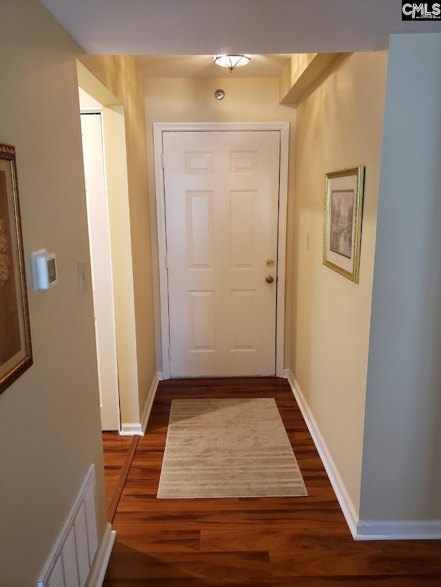 910 Poinsett Pl Unit 5, West Columbia, SC 29169 - entryway featuring baseboards, visible vents, and dark wood-type flooring