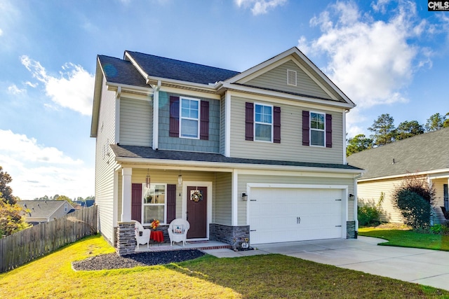 view of front of house featuring covered porch, an attached garage, fence, driveway, and a front lawn