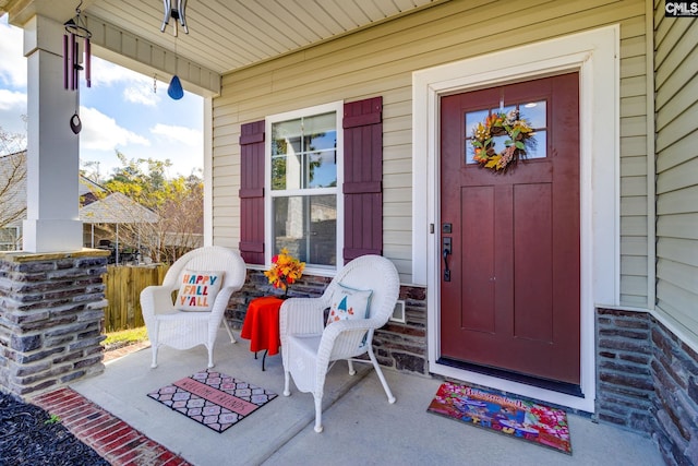 property entrance featuring a porch