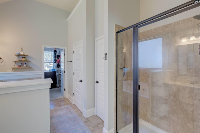 bathroom with a shower stall