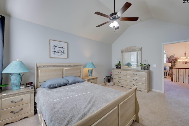 bedroom featuring light carpet, baseboards, vaulted ceiling, and ceiling fan with notable chandelier