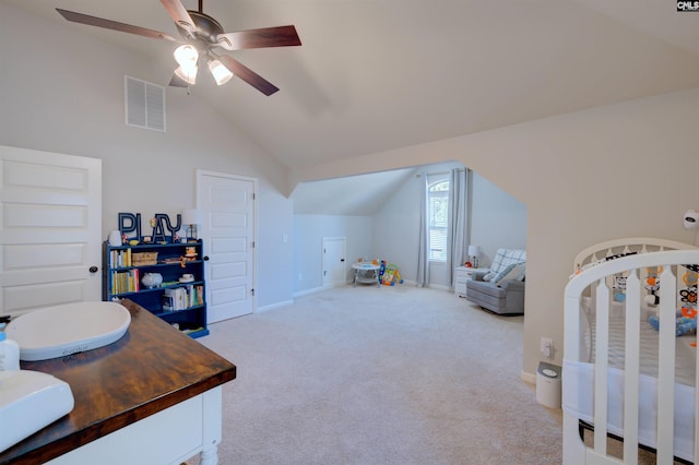 carpeted bedroom featuring vaulted ceiling, a ceiling fan, visible vents, and baseboards