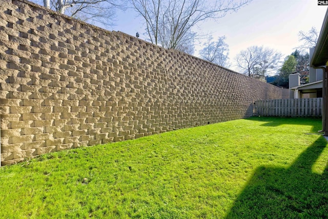 view of yard with fence