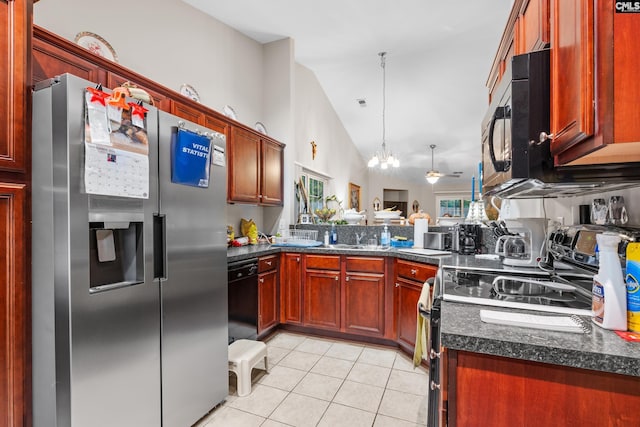 kitchen featuring lofted ceiling, an inviting chandelier, black appliances, pendant lighting, and light tile patterned flooring