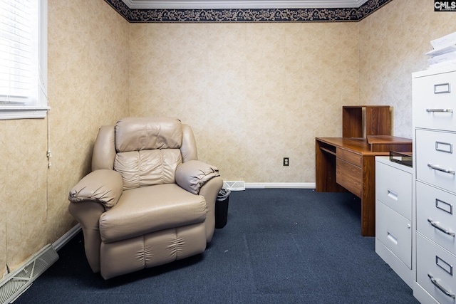 living area featuring baseboards, visible vents, carpet floors, wallpapered walls, and crown molding