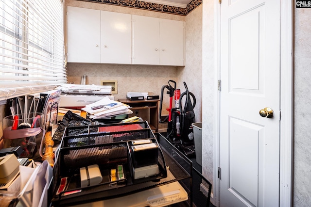 kitchen featuring white cabinets