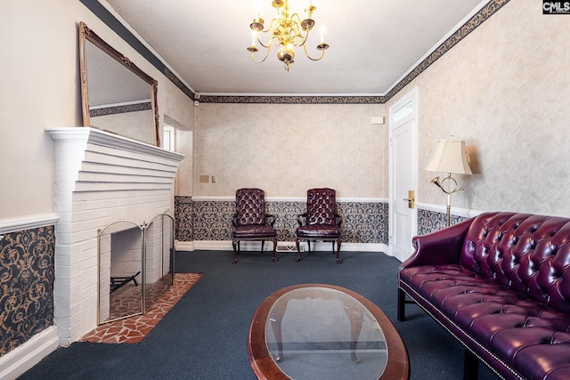 living room featuring a notable chandelier, a brick fireplace, wallpapered walls, and a wainscoted wall