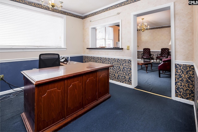 office with wainscoting, wallpapered walls, dark carpet, and an inviting chandelier