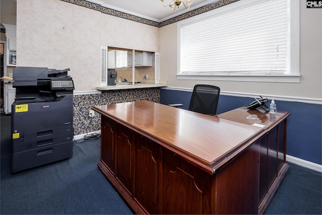 home office featuring dark carpet and ornamental molding