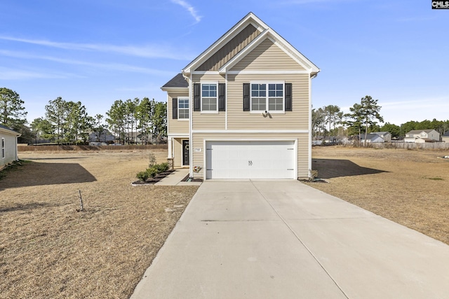 view of front of home with board and batten siding, concrete driveway, and an attached garage