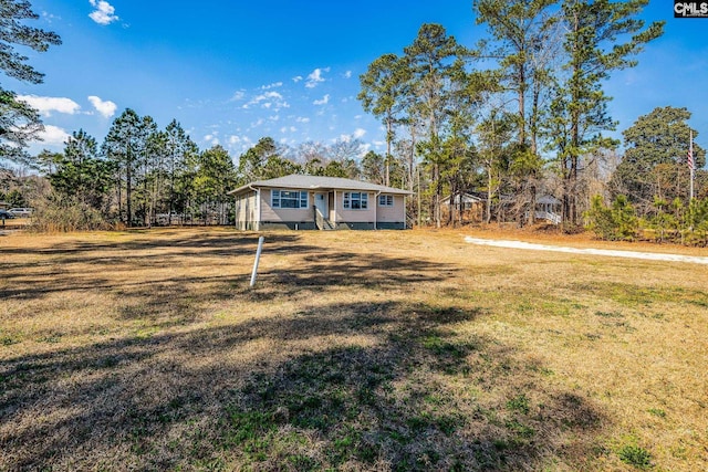 view of front of house with a front lawn