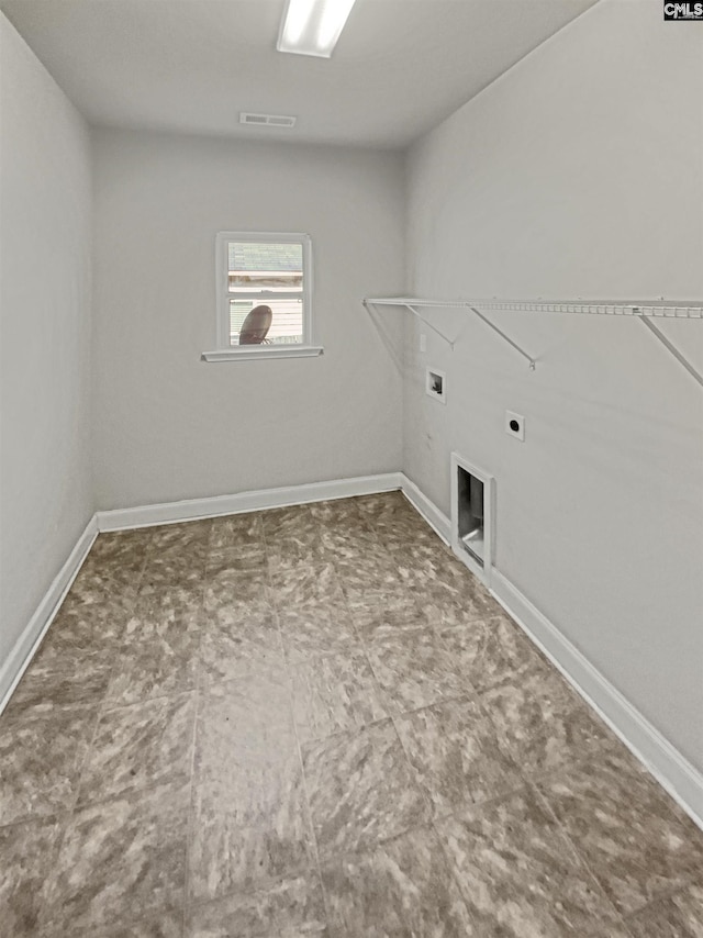 washroom with hookup for a washing machine, laundry area, visible vents, baseboards, and electric dryer hookup