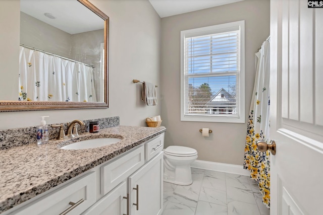 full bathroom with baseboards, toilet, marble finish floor, curtained shower, and vanity