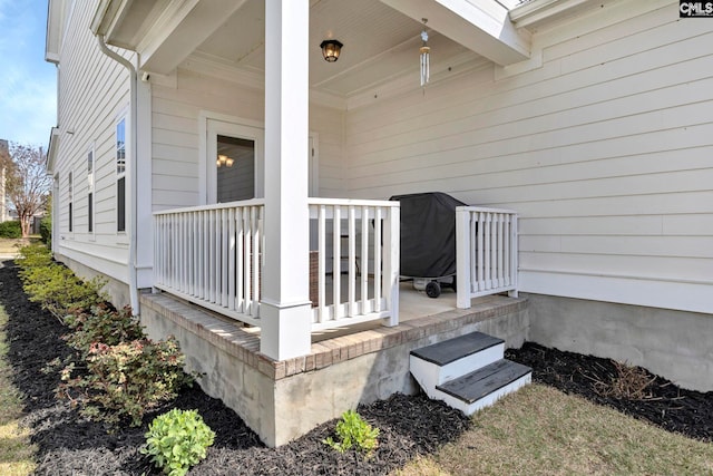 doorway to property featuring a porch