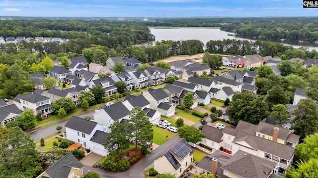 aerial view with a water view and a residential view