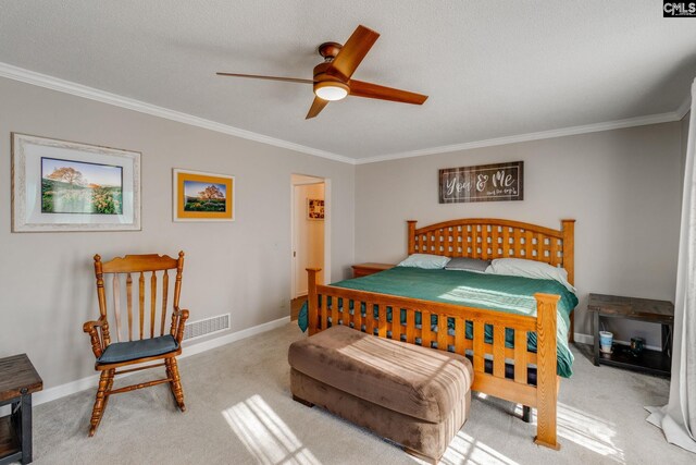 carpeted bedroom with ornamental molding, visible vents, and baseboards