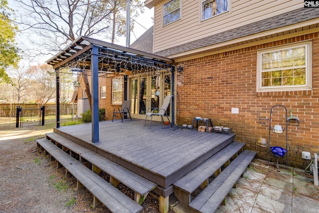 wooden deck with fence and a gazebo